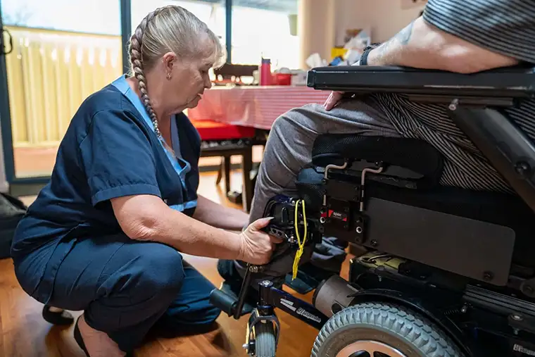 Registered Nurses for hire in Perth providing mobility assistance for an elderly